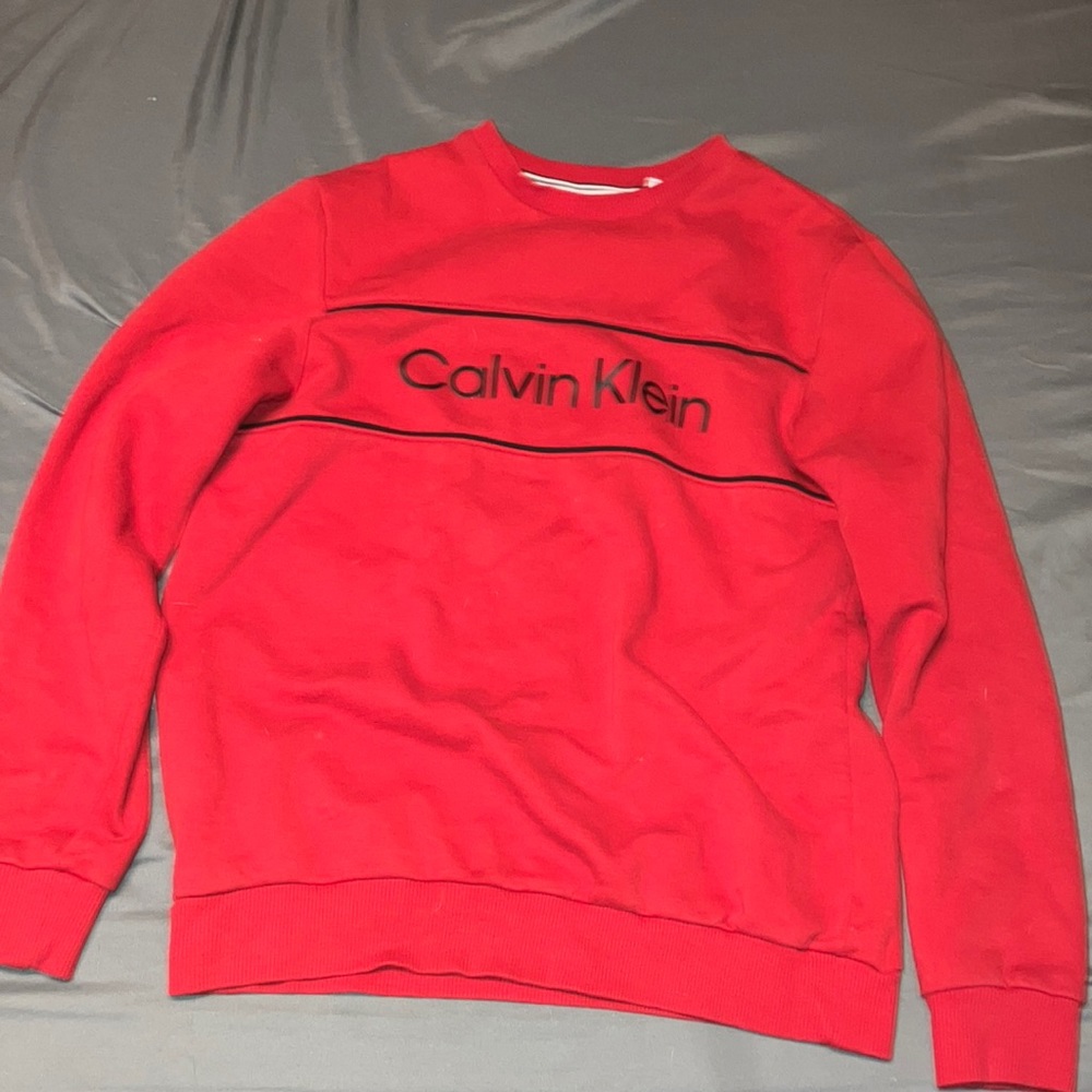 Selling a small red Calvin Klein crewneck. Wore a few times just don’t want it.